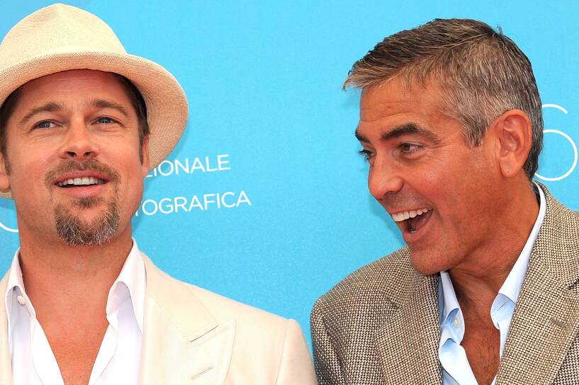 Brad Pitt i George Clooney, fot. PAP/EPA/CLAUDIO ONORATI