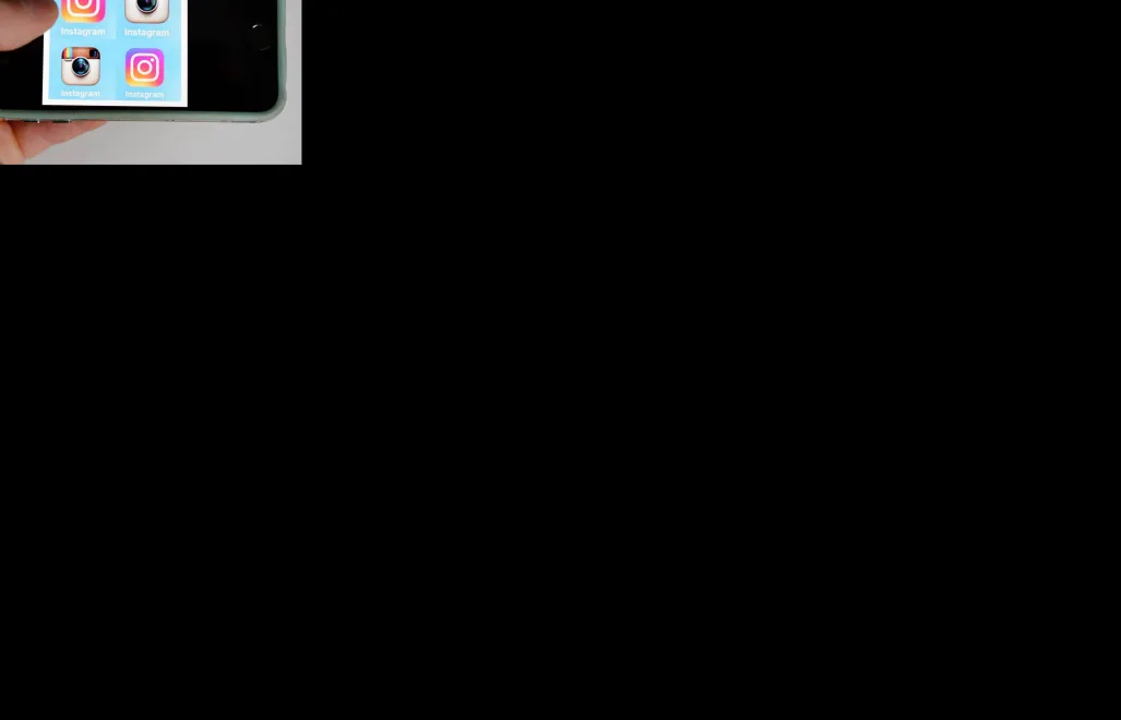 Telefon z aplikacją Instagram. Fot. PAP/DPA