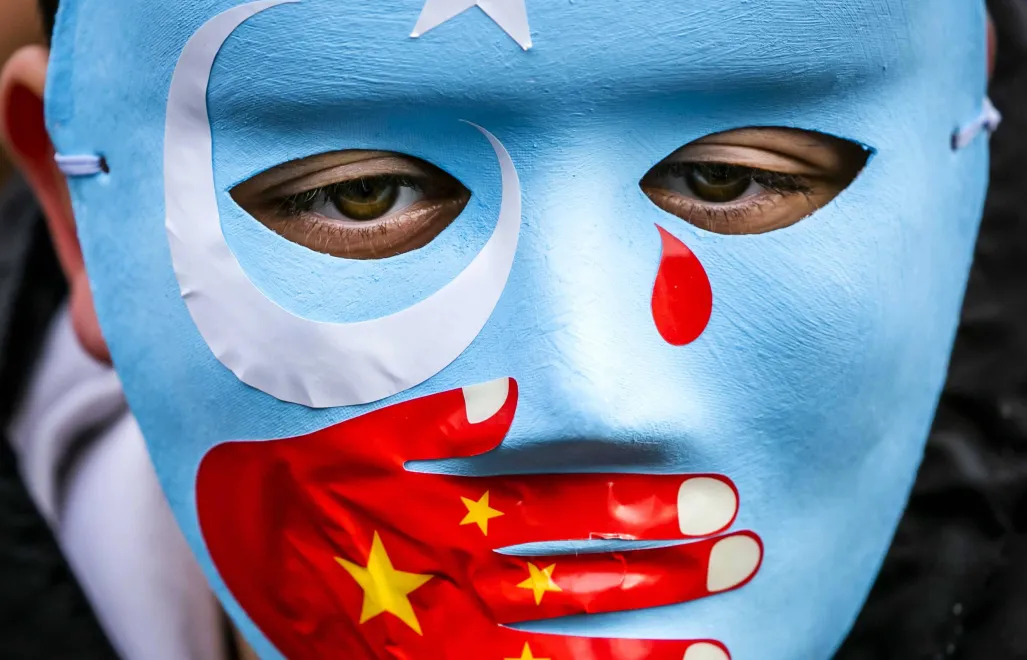 Demonstracja społeczności ujgurskiej w Amsterdamie, Fot. PAP/EPA/REMKO DE WAAL