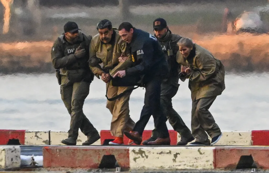 Schwytanie Nicolasa Maduro i jego żony. Fot. PAP/EPA/Stringer