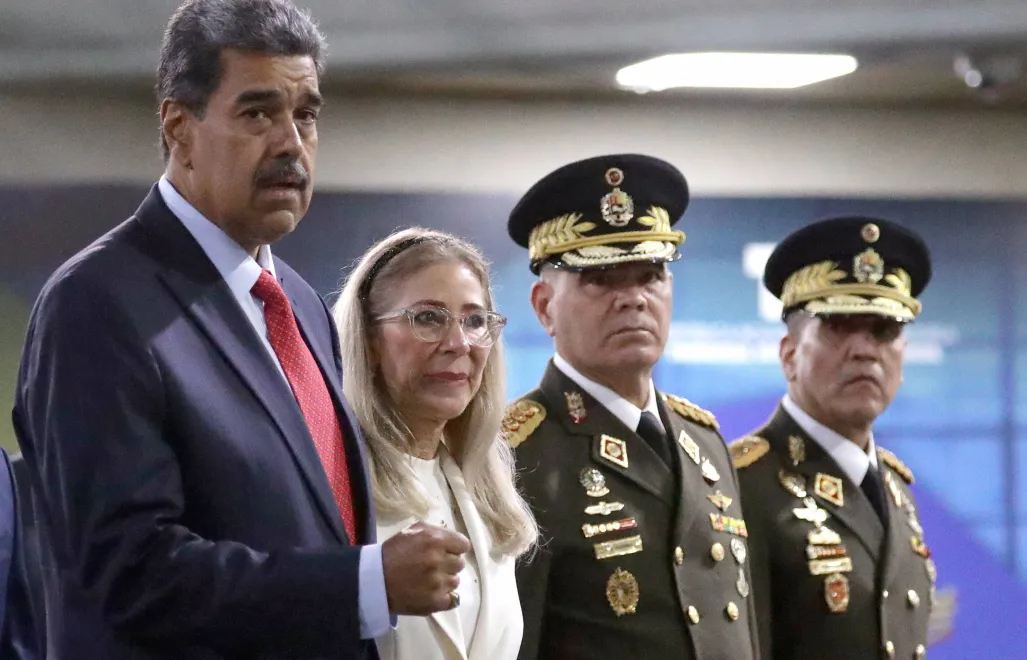 Nicolas Maduro i jego żona Cilia Flores. Fot. PAP/EPA/RONALD PENA R