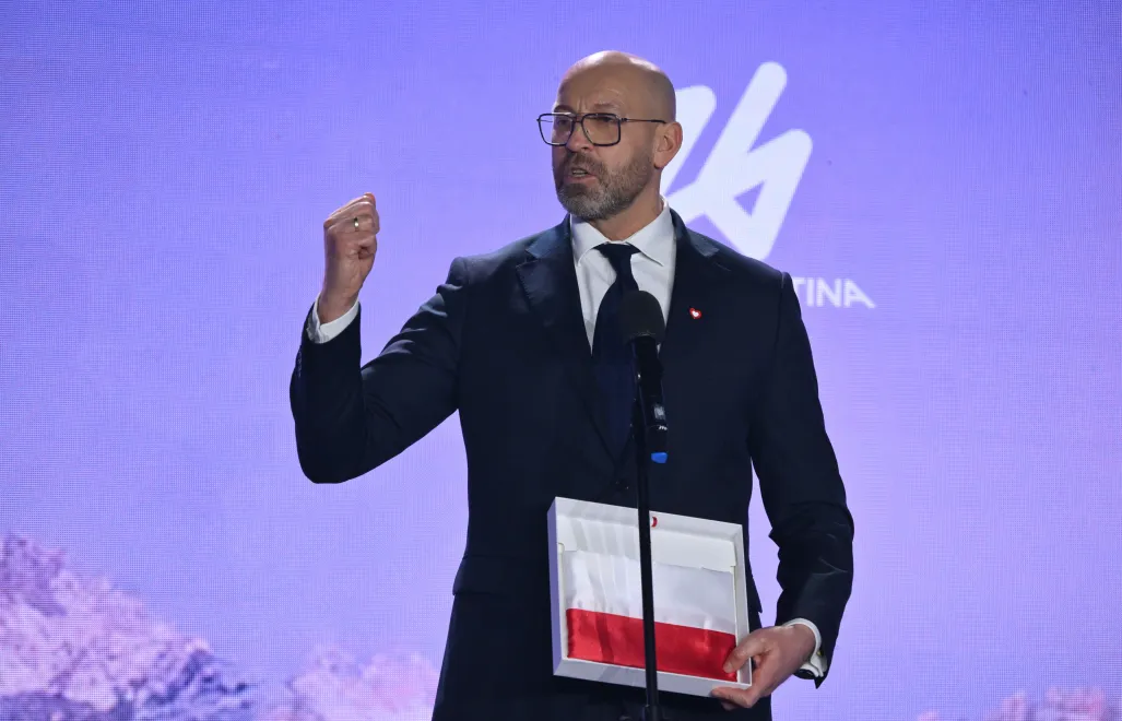 Minister sportu i turystyki Jakub Rutnicki przemawia podczas ceremonii ślubowania i wręczenia nominacji reprezentantom Polski na XXV Zimowe Igrzyska Olimpijskie Mediolan-Cortina 2026 Fot. PAP/Piotr Nowak