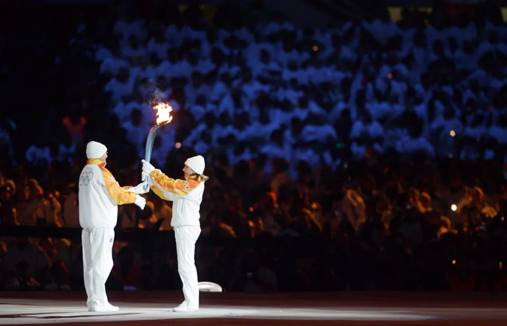 Alberto Tomba i Deborah Compagnoni podczas Zimowych Igrzysk w Turynie w 2006 roku Fot. PAP/BARTŁOMIEJ ZBOROWSKI