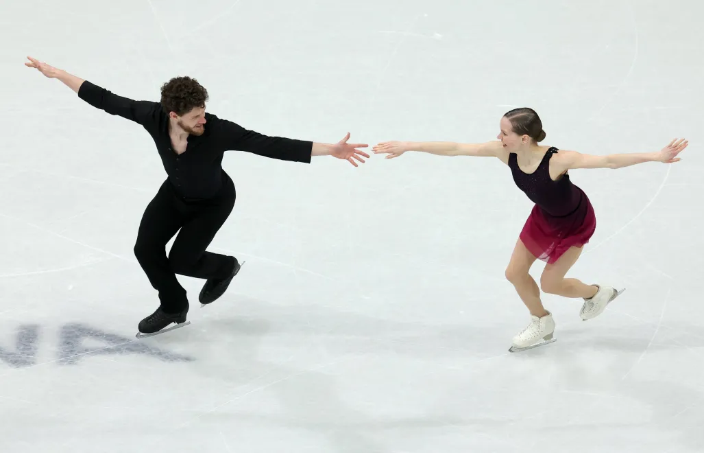 Julia Szczecinina i Michał Woźniak. Fot. PAP/EPA/	WU HAO