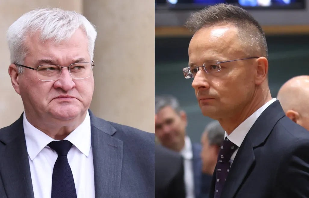 Szef MSZ Ukrainy Andrij Sybiha i szef MSZ Węgier Peter Szijjarto. Fot. PAP/EPA/OLIVIER HOSLET/TERESA SUAREZ