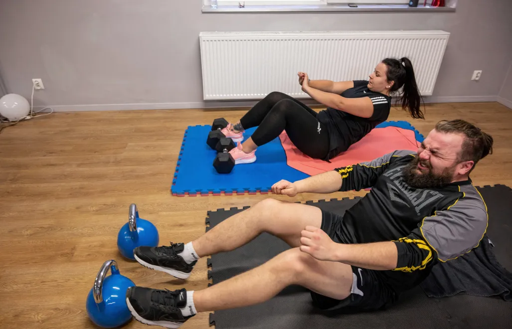 Trening na siłowni. Fot. PAP/Grzegorz Michałowski