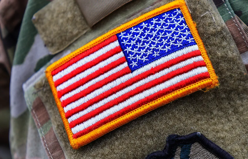 Нашивка із прапором США. Фотоілюстрація Fot. PAP/EPA/HANNIBAL HANSCHKE 