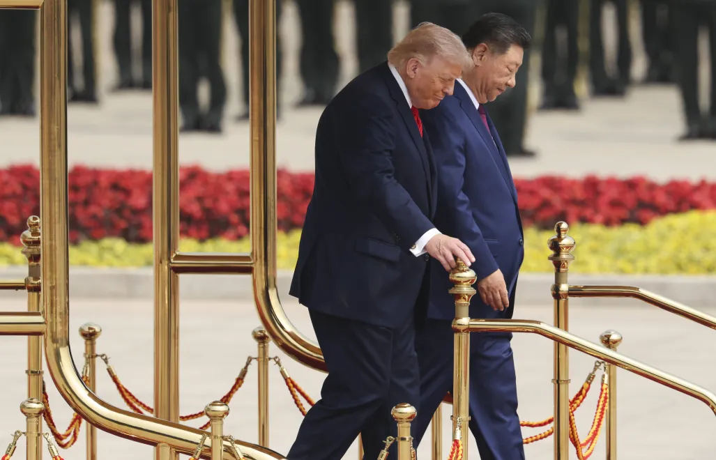 Prezydent USA Donald Trump i przywódca Chin Xi Jinping. Fot. PAP/EPA/Maxim Shemetov / POOL