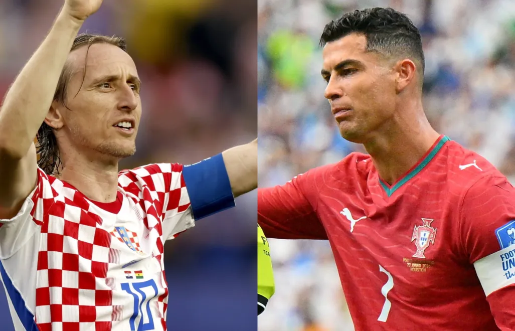 Luka Modrić i Cristiano Ronaldo. Fot. PAP/EPA/WILL OLIVER/SAM WASSON