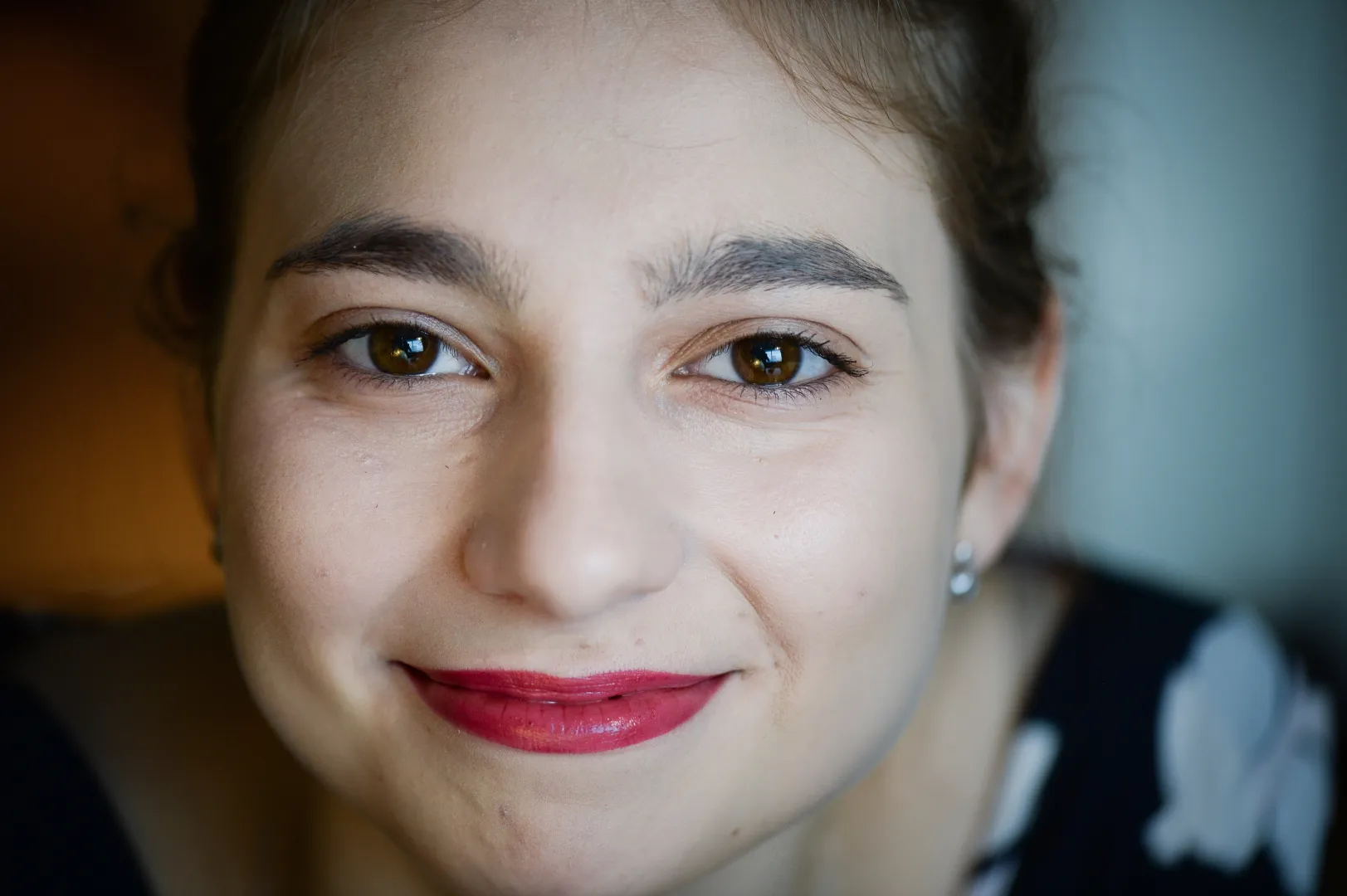 Uśmiechnięta twarz kobieca. Fot. PAP/Jacek Turczyk