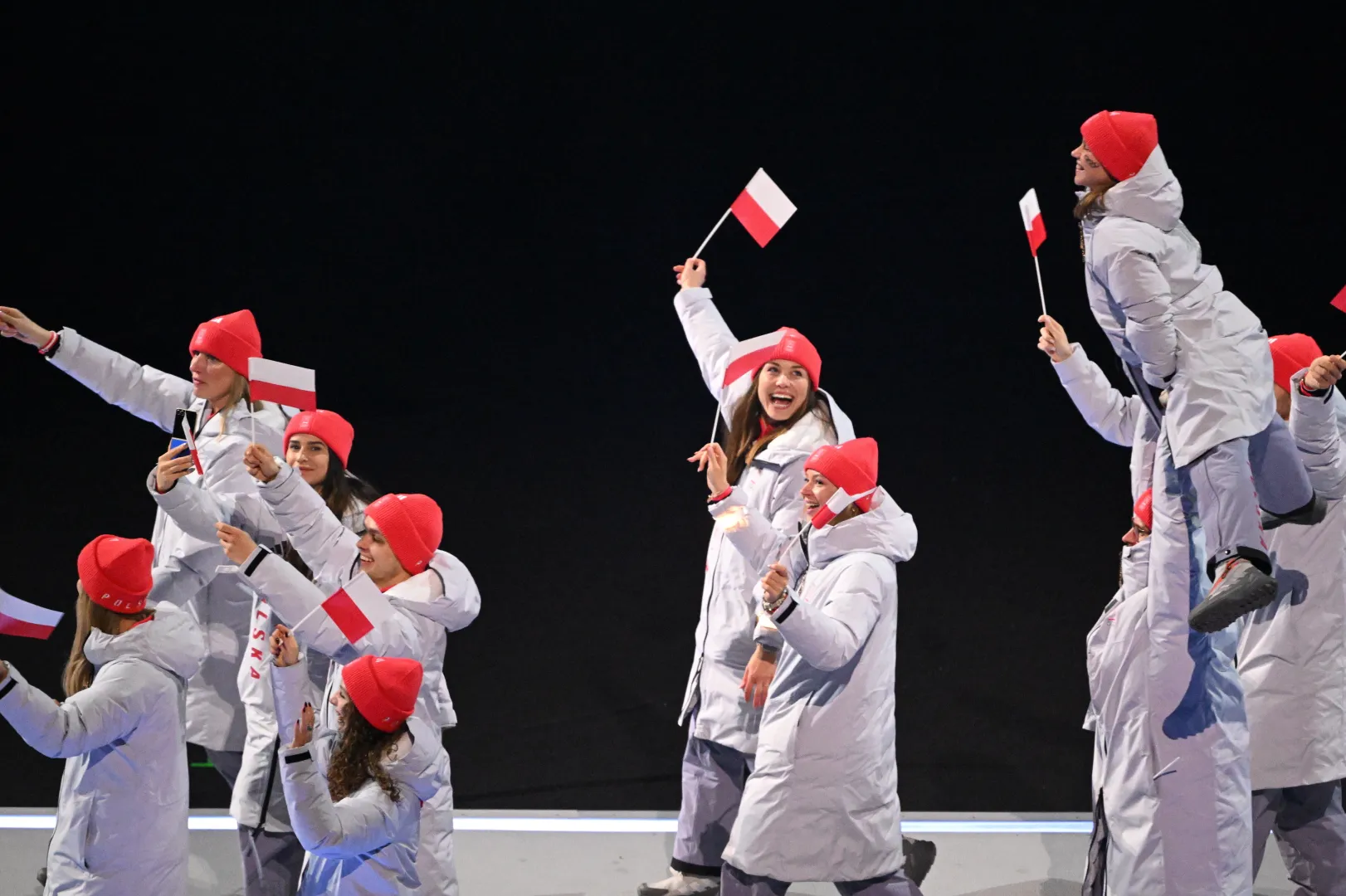 Olimpijska reprezentacja Polski podczas ceremonii otwarcia zimowych igrzysk we Włoszech. Fot. PAP/	Paweł Skraba