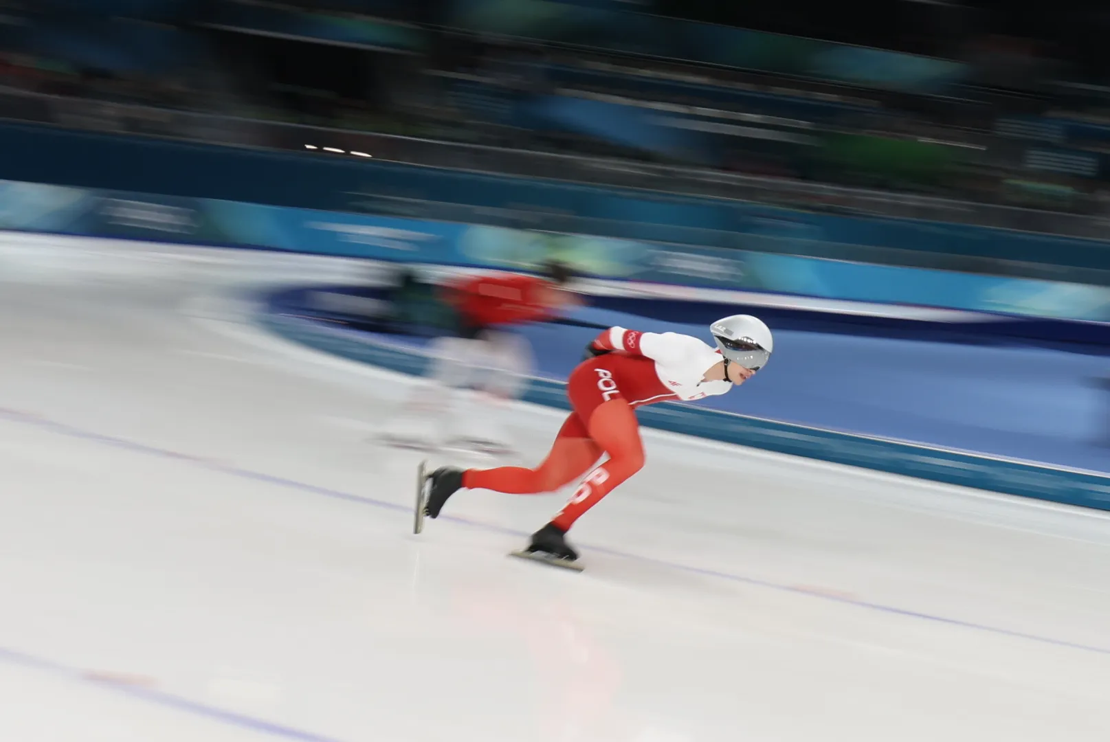 . Reprezentant Polski Władimir Semirunnij (P) w biegu na 1500 m łyżwiarzy szybkich, fot. PAP/Grzegorz Momot