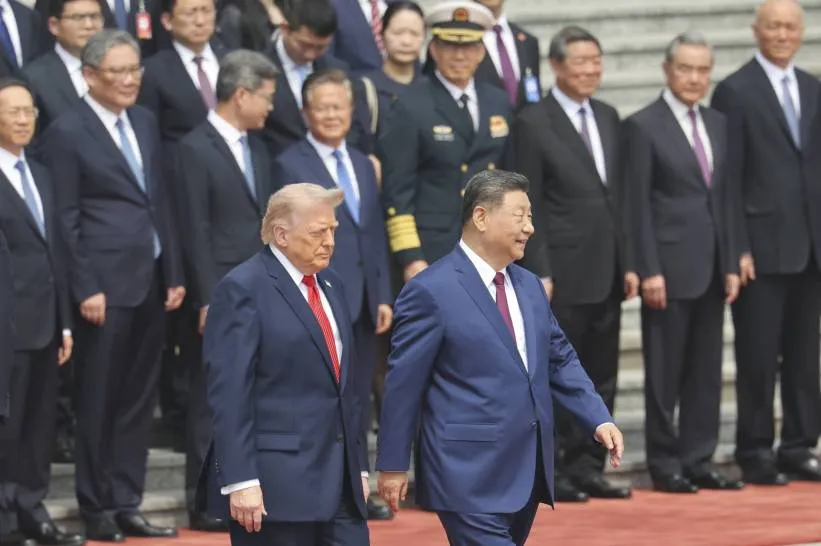 Prezydent USA Donald Trump i przywódca Chin Xi Jinping. Fot. PAP/EPA/Maxim Shemetov / POOL