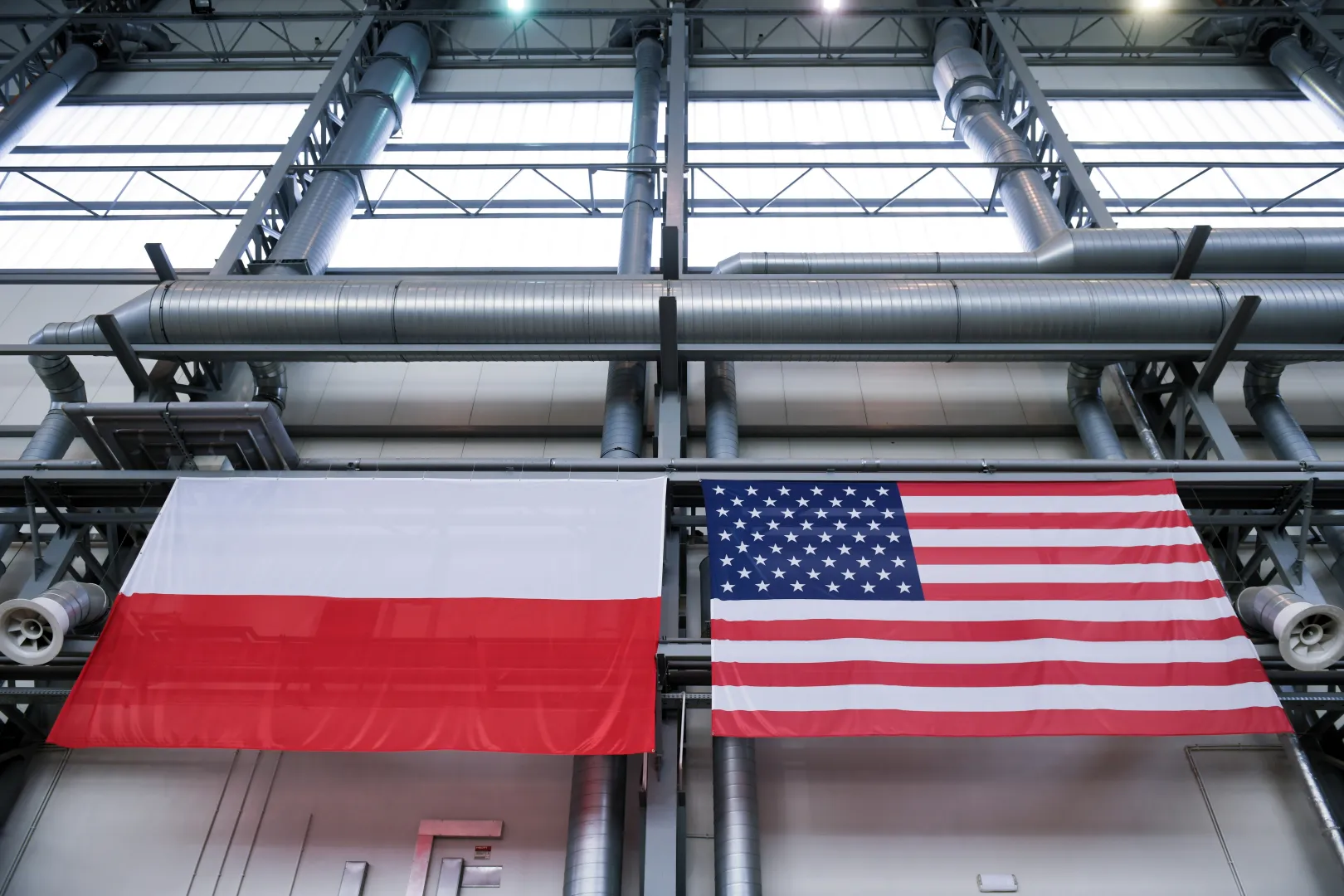 USA and Polish flags. Photo: PAP/Jakub Kaczmarczyk