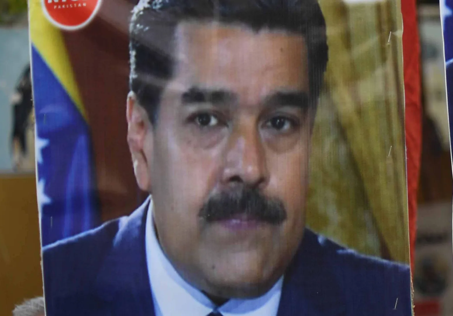 Fragment transparentu z Nicolasem Maduro Fot. PAP/EPA/SHAHZAIB AKBER