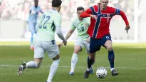 Erling Haaland (z prawej) i Szwajcar Fabian Rieder (z lewej) podczas towarzyskiego meczu Norwegia-Szwacjaria fot. PAP/EPA/KEYSTONE/CYRIL ZINGARO