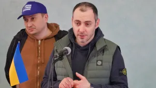 Wicepremier Ukrainy (przy mikrofonie) Fot. PAP/Alena Solomonova