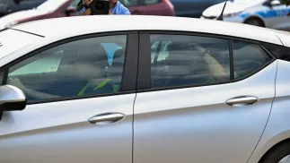 Doprowadzenie do prokuratury proboszcza. Fot. PAP/Piotr Polak