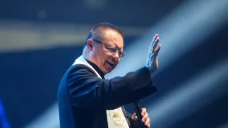 Kard. Grzegorz Ryś podczas spotkania rekolekcyjnego archidiecezji łódzkiej organizowanego ph. „Arena Młodych” w Atlas Arenie w Łodzi Fot. PAP/Marian Zubrzycki