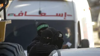 Bojownicy Al-Qassam, skrzydła zbrojnego Hamasu, fot. PAP/EPA/MOHAMMED SABER