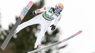 Dawid Kubacki. Fot. EPA/PHILIPP SCHMIDLI 