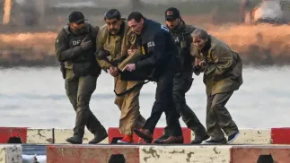 Schwytanie Nicolasa Maduro i jego żony. Fot. PAP/EPA/Stringer