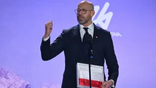 Minister sportu i turystyki Jakub Rutnicki przemawia podczas ceremonii ślubowania i wręczenia nominacji reprezentantom Polski na XXV Zimowe Igrzyska Olimpijskie Mediolan-Cortina 2026 Fot. PAP/Piotr Nowak