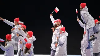 Olimpijska reprezentacja Polski podczas ceremonii otwarcia zimowych igrzysk we Włoszech. Fot. PAP/	Paweł Skraba