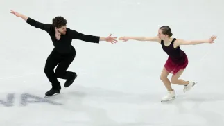 Julia Szczecinina i Michał Woźniak. Fot. PAP/EPA/	WU HAO