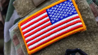 Нашивка із прапором США. Фотоілюстрація Fot. PAP/EPA/HANNIBAL HANSCHKE 