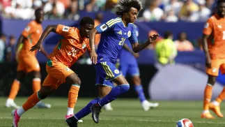 Christ Inao Oulai, Tahith Chong. Fot. PAP/EPA/WILL OLIVER