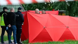 Funkcjonariusze policji na miejscu zbrodni w Białej Podlaskiej. Fot. PAP/Wojtek Jargiło