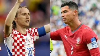Luka Modrić i Cristiano Ronaldo. Fot. PAP/EPA/WILL OLIVER/SAM WASSON