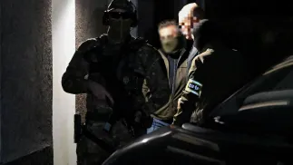  Patryk M. ps. Wielki Bu doprowadzany do Lubelskiego Wydziału Zamiejscowego Departamentu do Spraw Przestępczości Zorganizowanej i Korupcji Prokuratury Krajowej w Lublinie. Fot. PAP/Wojtek Jargiło 