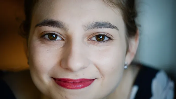 Uśmiechnięta twarz kobieca. Fot. PAP/Jacek Turczyk